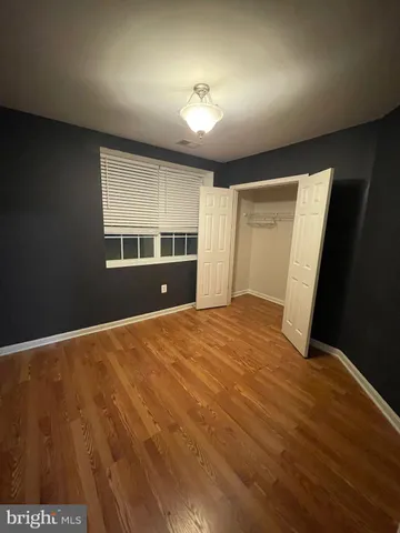 a view of balcony with wooden floor
