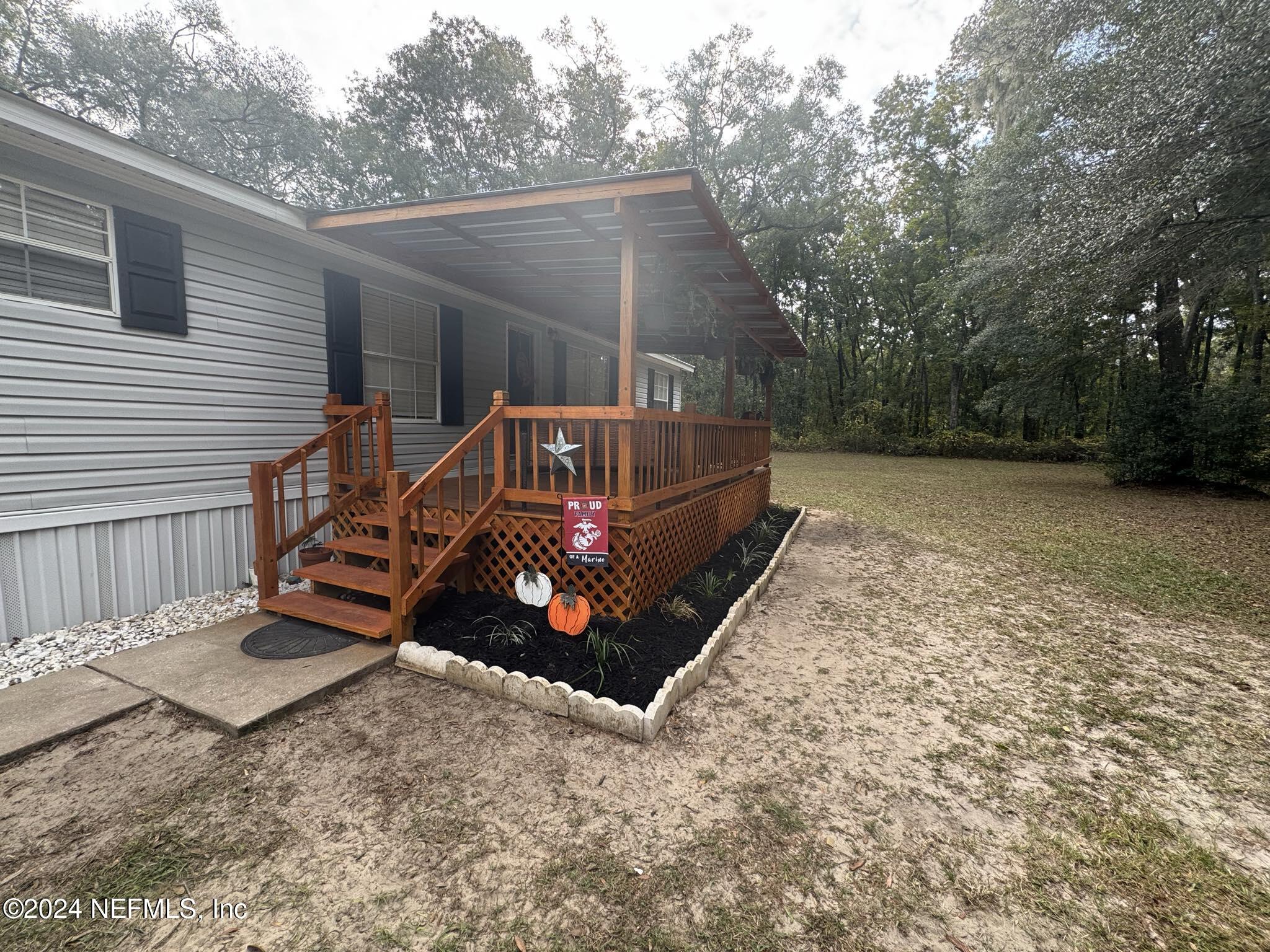 208 Tanner School Bus Road Florahome, FL 32140 - Photo 3 of 31 a00aba10-4f81-479a-96dc-253b25fda515