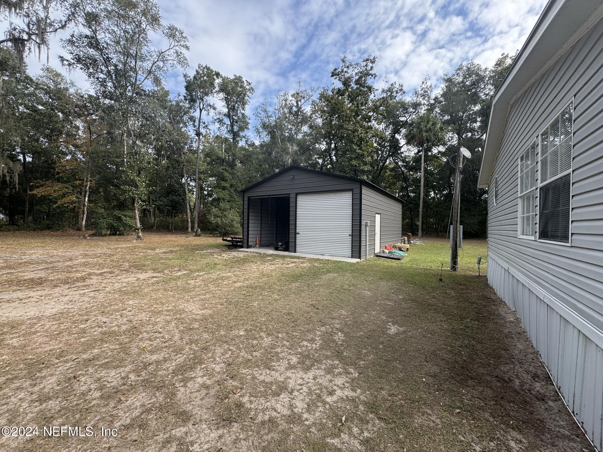 208 Tanner School Bus Road Florahome, FL 32140 - Photo 9 of 31 7d37863e-a7d0-427c-bd08-8781c979ae6e