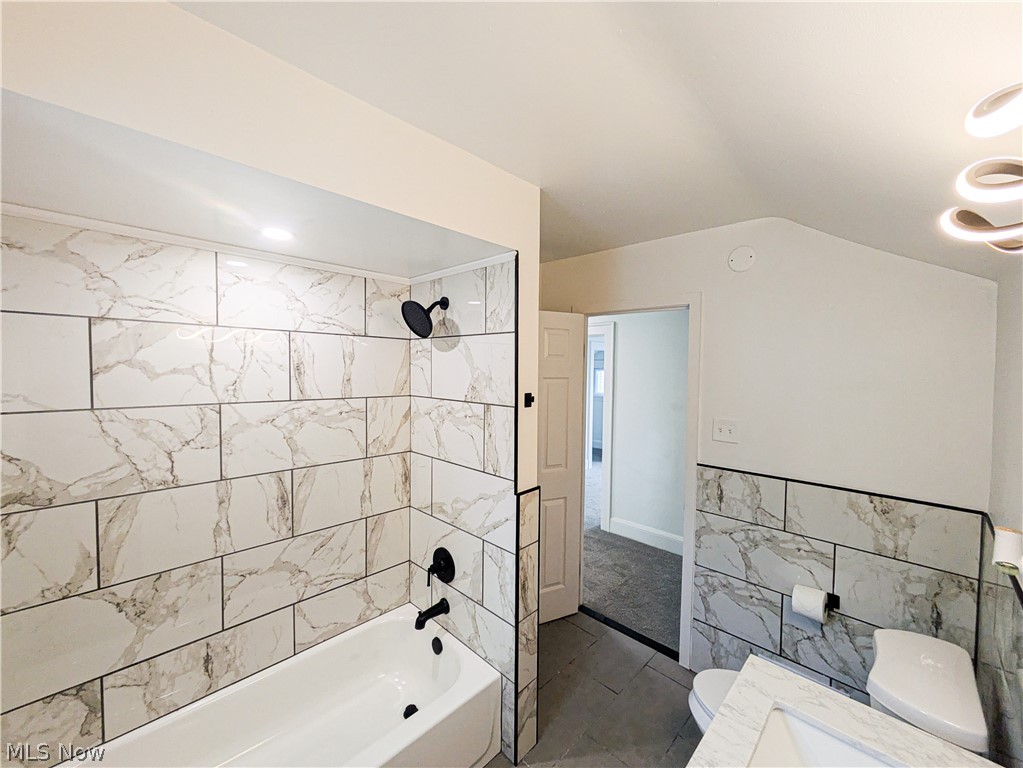 3554 Ludgate Road Shaker Heights, OH 44120 - Photo 36 of 50 Bathroom on 2nd level w/ bathtub and shower featuring subway tile surround, matte black fixtures, and recessed lighting