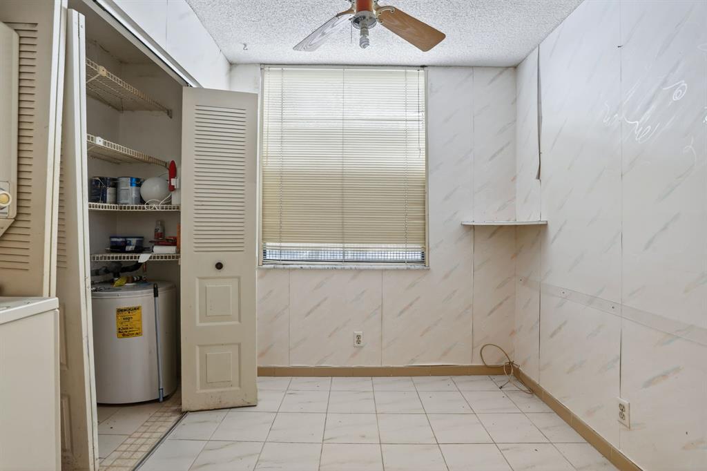 7360 Northwest 18th Street, Unit 103 Margate, FL 33063 - Photo 6 of 24 a view of storage and utility room with closet