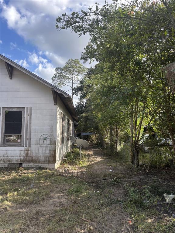 320 West Magnolia Street Fitzgerald, GA 31750 - Photo 13 of 14 a view of a house with a yard