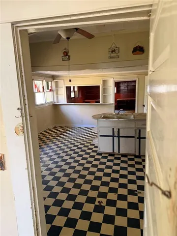 a picture of a bathroom with a sink and a mirror
