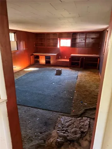 a bathroom with a sink a toilet and a shower