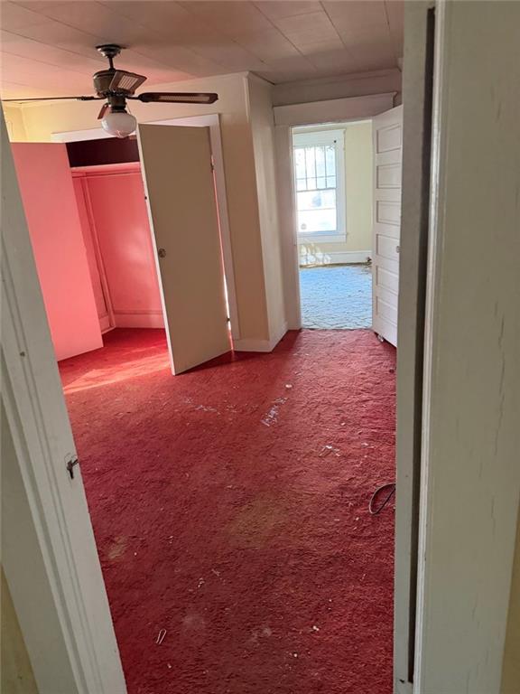 320 West Magnolia Street Fitzgerald, GA 31750 - Photo 9 of 14 an empty room with windows