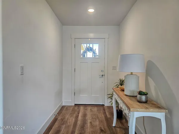 a workspace with furniture and wooden floor
