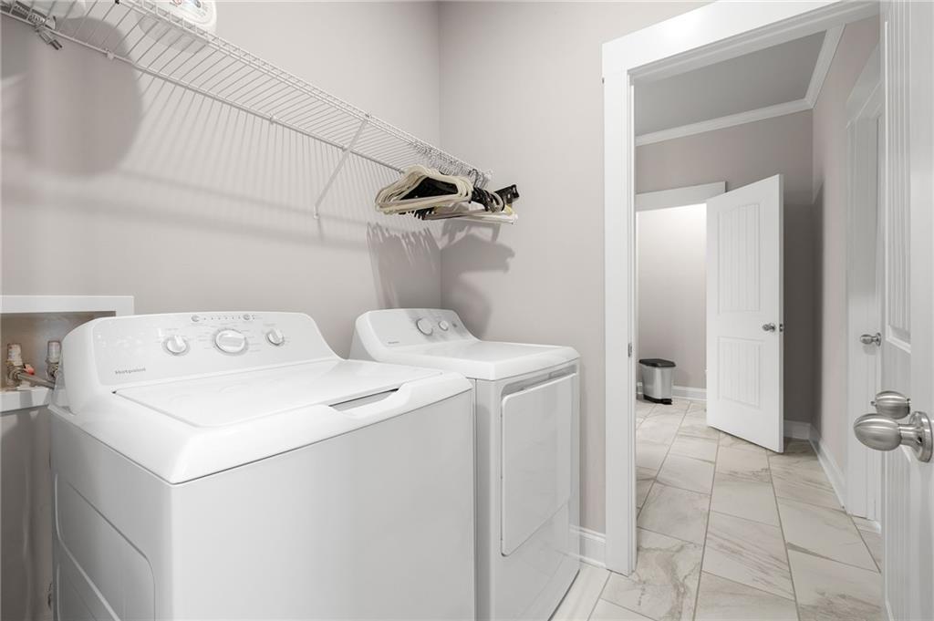 2440 Traditions Way Jefferson, GA 30549 - Photo 13 of 32 a utility room with dryer and washer