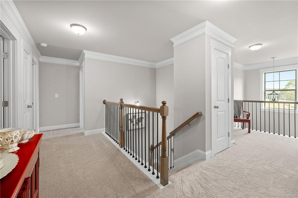 2440 Traditions Way Jefferson, GA 30549 - Photo 17 of 32 a view of a hallway with a livingroom with furniture