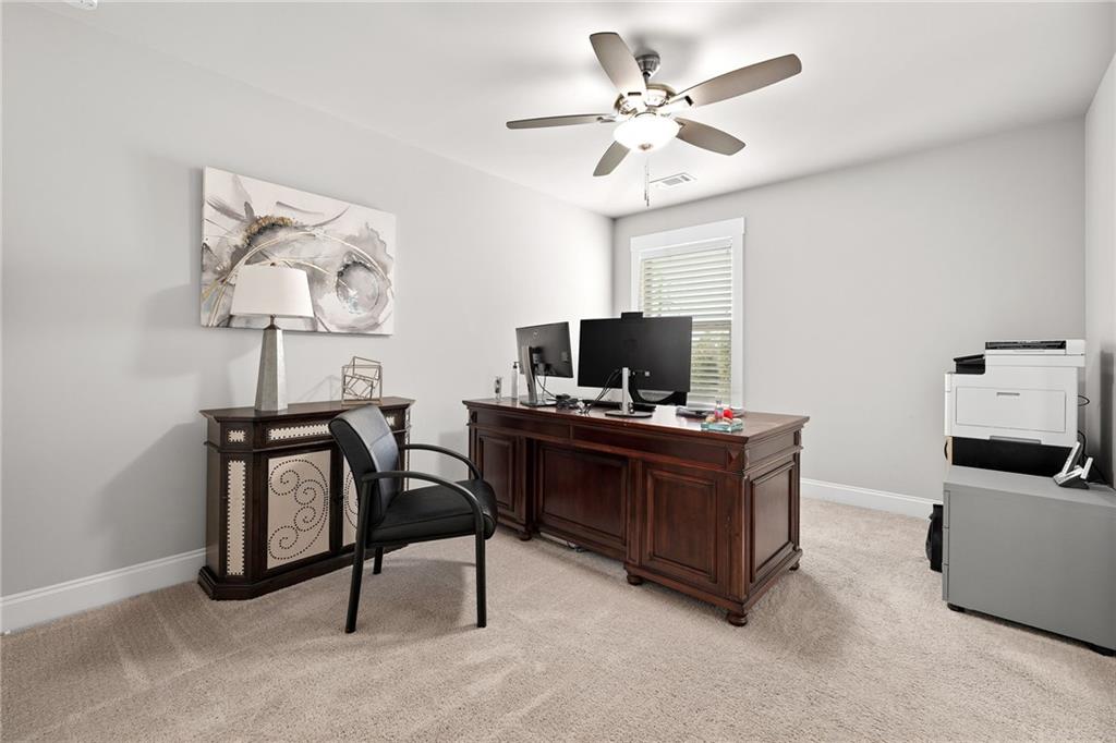 2440 Traditions Way Jefferson, GA 30549 - Photo 20 of 32 a view of a workspace with furniture