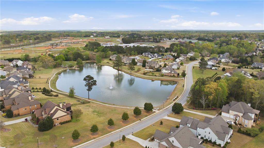 2440 Traditions Way Jefferson, GA 30549 - Photo 30 of 32 an aerial view of a house with a swimming pool