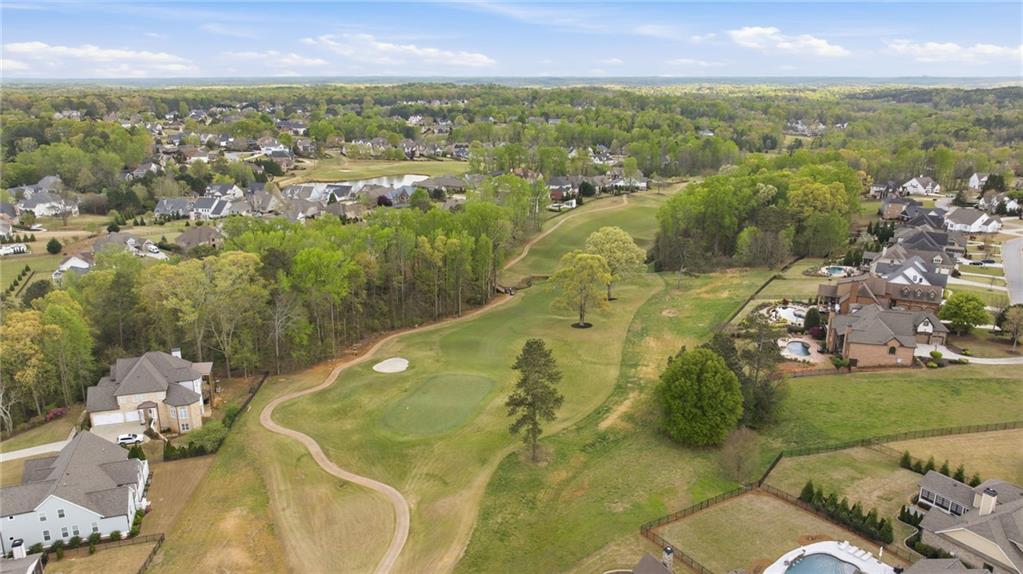 2440 Traditions Way Jefferson, GA 30549 - Photo 31 of 32 an aerial view of residential houses with outdoor space