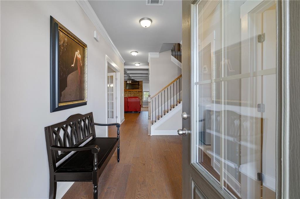 2440 Traditions Way Jefferson, GA 30549 - Photo 4 of 32 a view of front door with chair and wooden floor