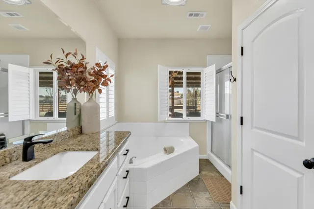 a view of a terrace with a lake view