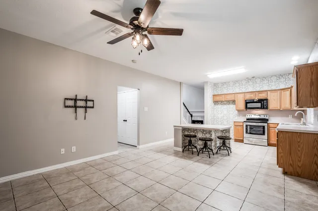 a view of a workspace with furniture