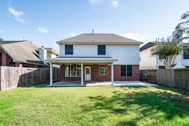 a view of a porch and garden