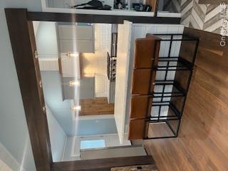 24 Woodridge Road Hampton Bays, NY 11946 - Photo 16 of 18 a kitchen with a stove and a refrigerator