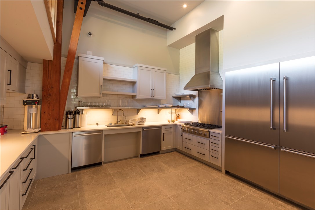 237 Vendette Road Silverthorne, CO 80498 - Photo 12 of 17 a kitchen with stainless steel appliances granite countertop a refrigerator and a stove