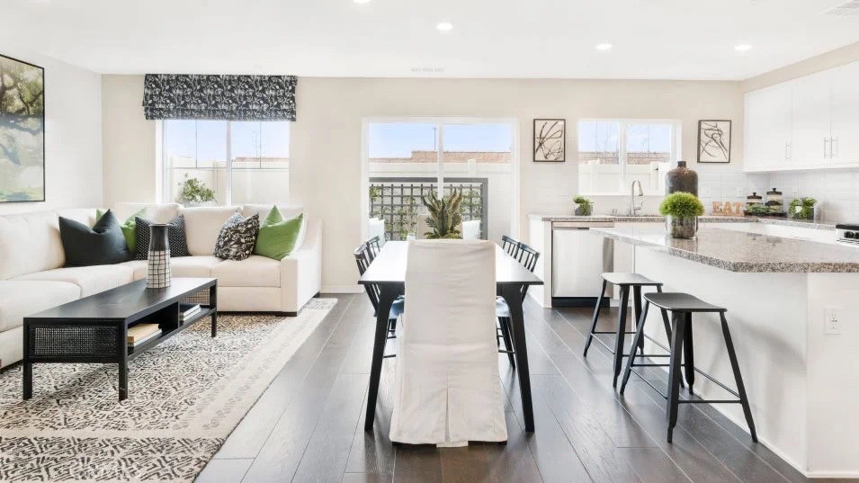 7464 Fig Grv Lane Riverside, CA 92507 - Photo 5 of 17 a view of a dining room with furniture and wooden floor