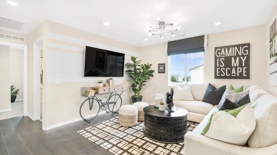 7464 Fig Grv Lane Riverside, CA 92507 - Photo 6 of 17 a living room with furniture and a flat screen tv