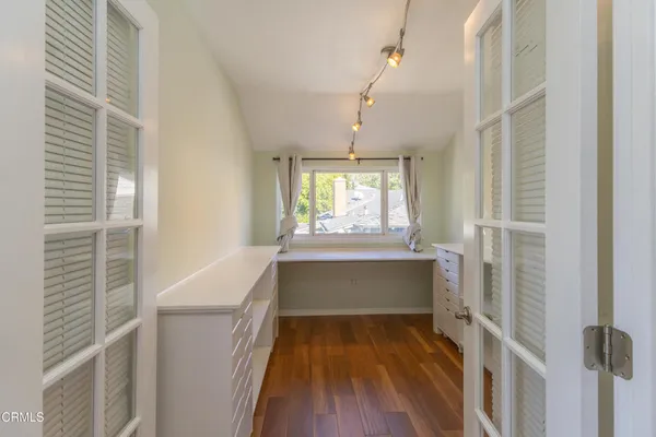 a room with window and a wooden floor