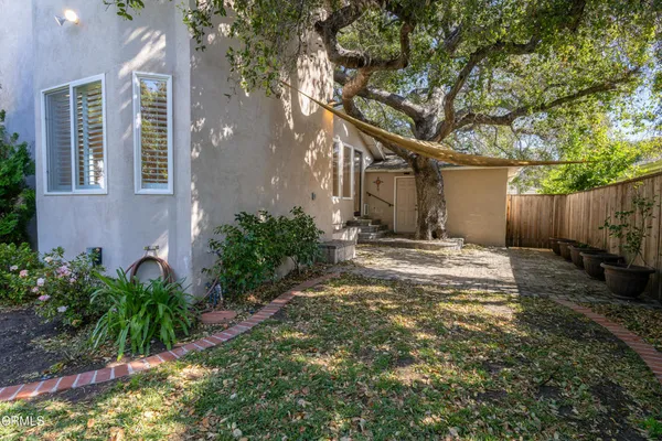 a backyard of a house with lots of green space