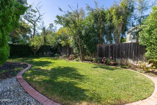 a view of swimming pool in a yard