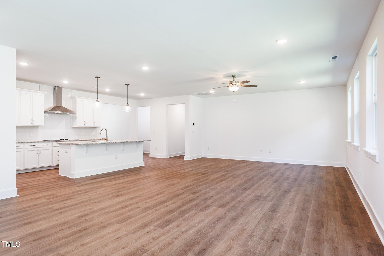 283 Golfview Avenue Four Oaks, NC 27524 - Photo 13 of 25 a view of kitchen with kitchen island sink stainless steel appliances and cabinets