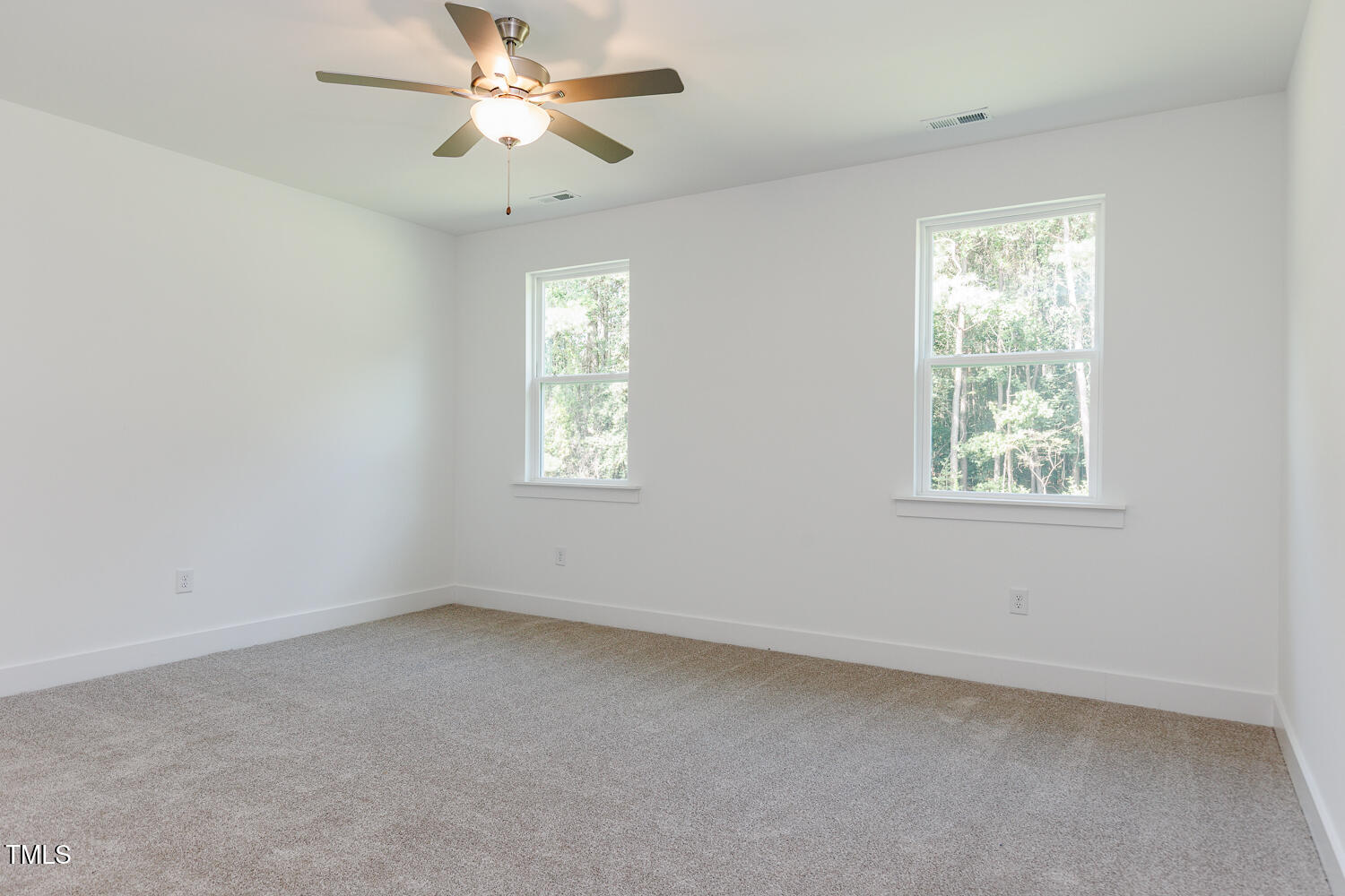 283 Golfview Avenue Four Oaks, NC 27524 - Photo 16 of 25 a view of an empty room with a window
