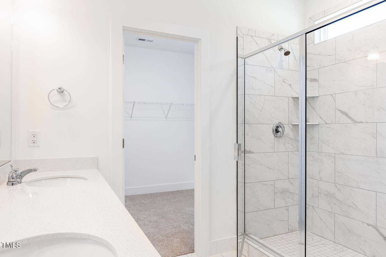 283 Golfview Avenue Four Oaks, NC 27524 - Photo 19 of 25 a bathroom with a sink and shower