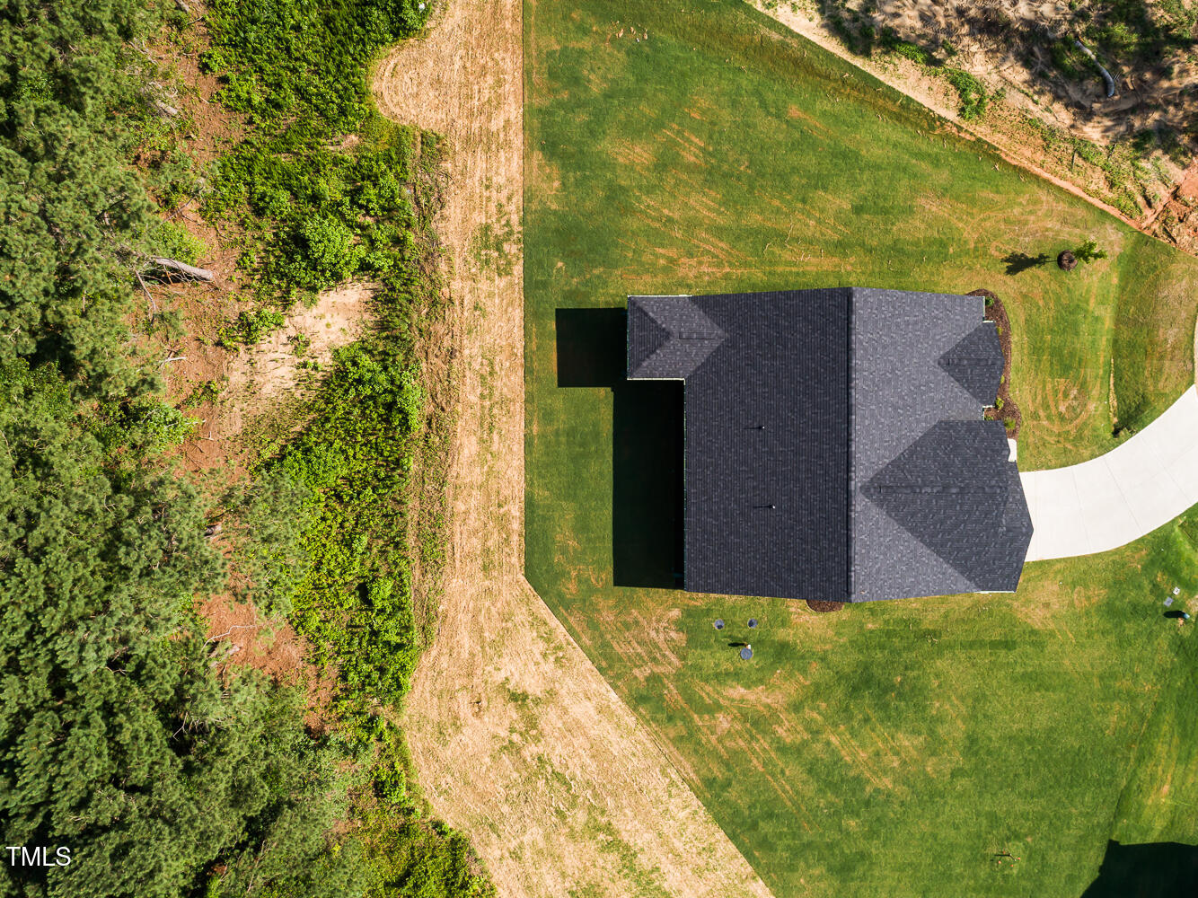 283 Golfview Avenue Four Oaks, NC 27524 - Photo 5 of 25 a view of a backyard