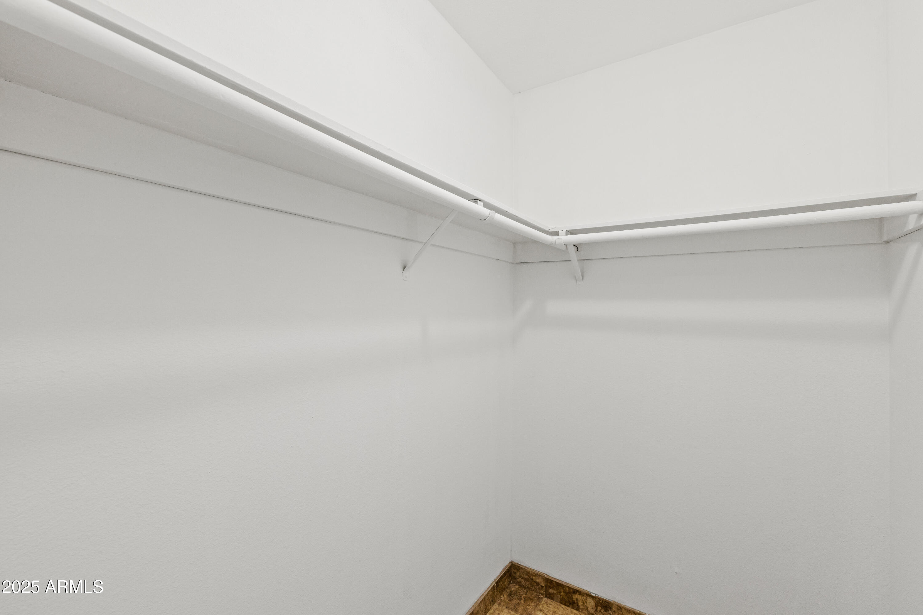 5525 East Thomas Road, Unit R11 Phoenix, AZ 85018 - Photo 12 of 15 a view of a room with shelf on the wall