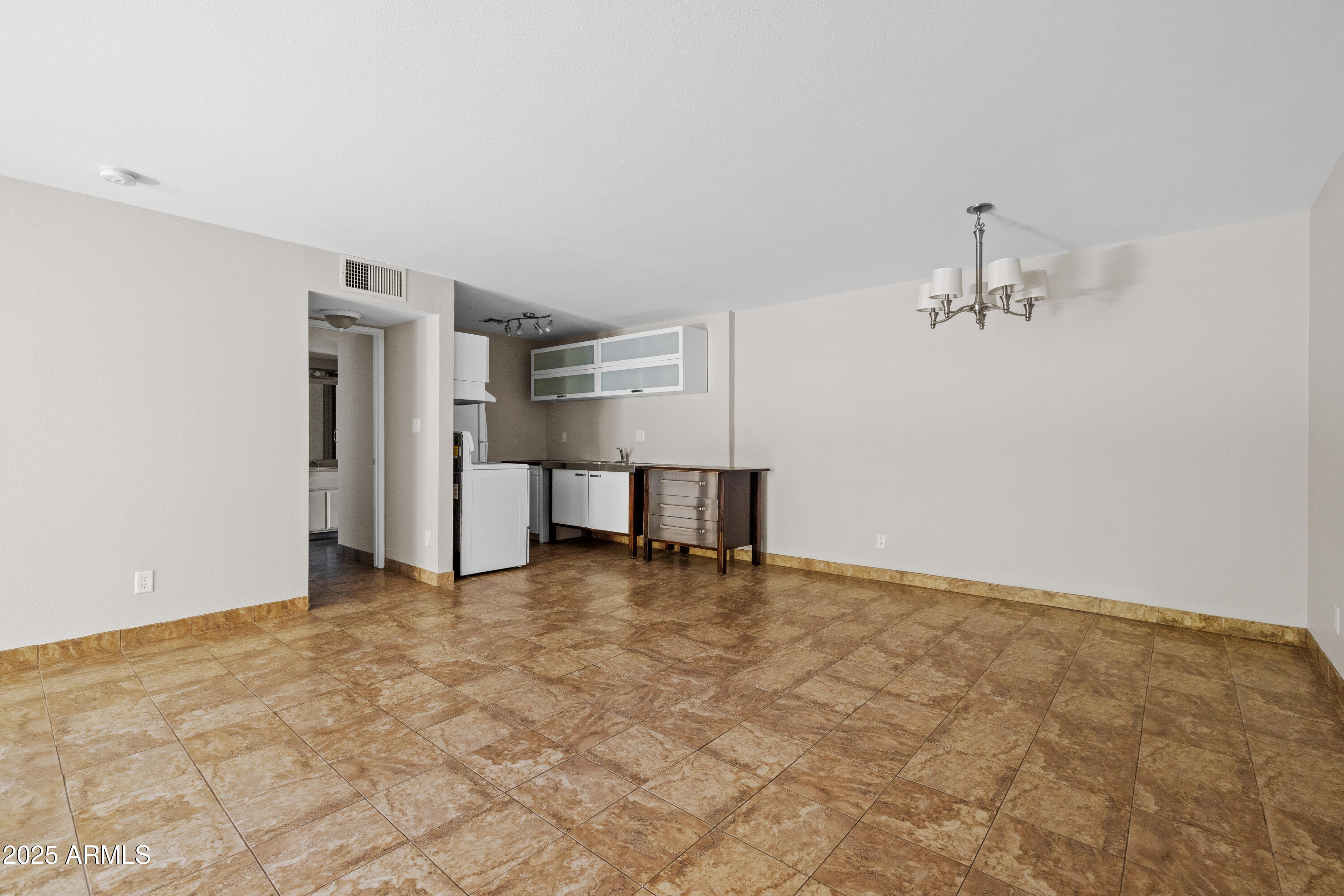 5525 East Thomas Road, Unit R11 Phoenix, AZ 85018 - Photo 3 of 15 a view of a livingroom with a staircase
