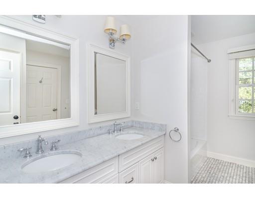 3 Dewing Path Wellesley, MA 02482 - Photo 14 of 25 a bathroom with a sink and a mirror