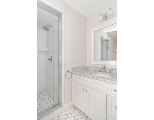 3 Dewing Path Wellesley, MA 02482 - Photo 15 of 25 a bathroom with a sink and a mirror
