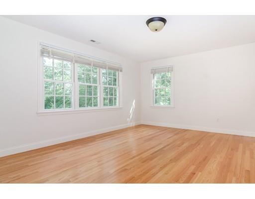 3 Dewing Path Wellesley, MA 02482 - Photo 16 of 25 a view of an empty room with wooden floor and a window