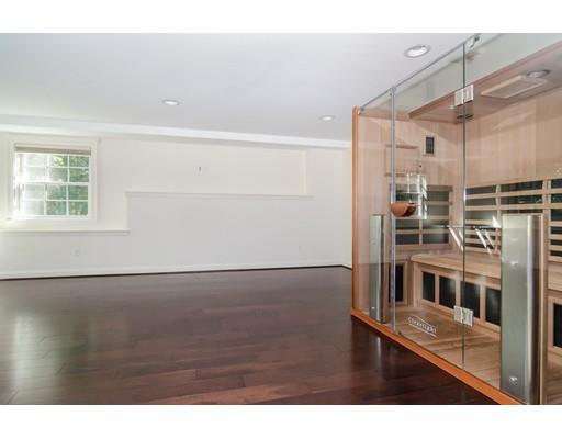 3 Dewing Path Wellesley, MA 02482 - Photo 20 of 25 a view of an empty room with wooden floor and a window