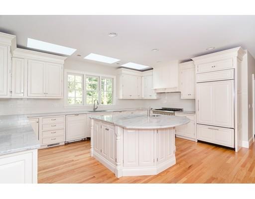 3 Dewing Path Wellesley, MA 02482 - Photo 2 of 25 a kitchen with a sink a stove a refrigerator and white cabinets