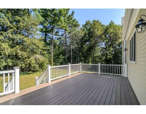 3 Dewing Path Wellesley, MA 02482 - Photo 24 of 25 a view of a roof deck with wooden floor and fence