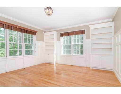 3 Dewing Path Wellesley, MA 02482 - Photo 7 of 25 an empty room with wooden floor and windows