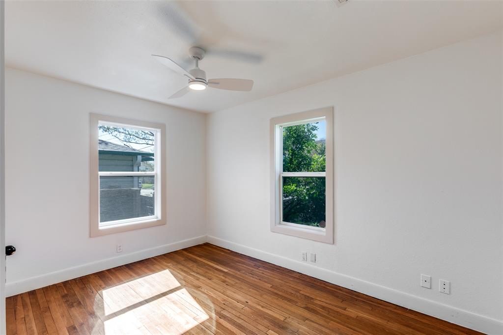 2012 Payne Avenue, Unit A Austin, TX 78757 - Photo 22 of 33 bedroom with Hardwood flooring complemented by white walls