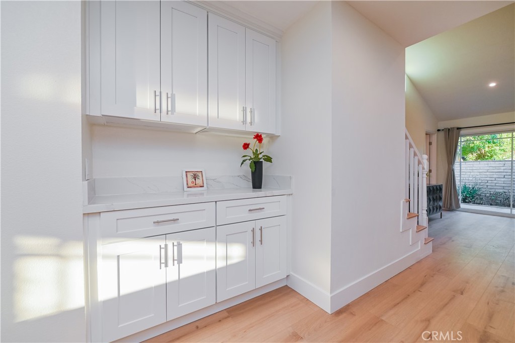 15 Camphor South Irvine, CA 92612 - Photo 15 of 28 a kitchen with white cabinets and window