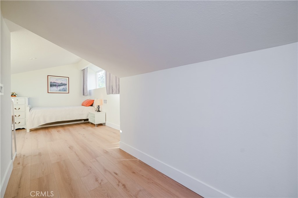 15 Camphor South Irvine, CA 92612 - Photo 19 of 28 a view of a room with wooden floor and closet