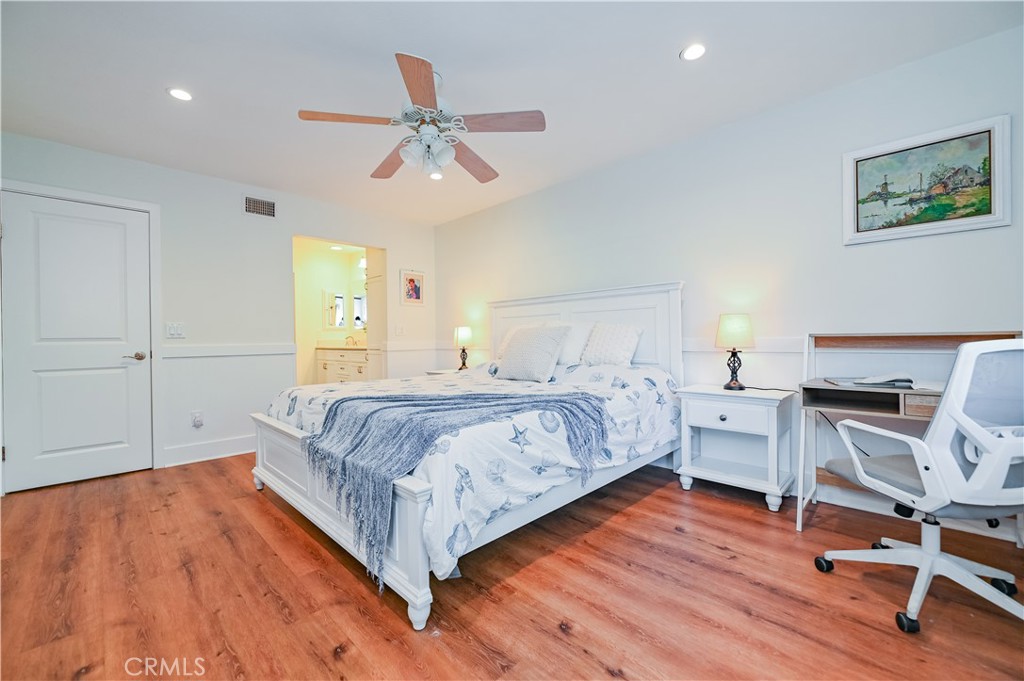 15 Camphor South Irvine, CA 92612 - Photo 2 of 28 a bedroom with a bed and a chandelier