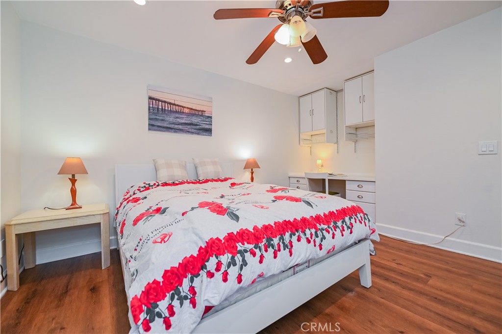 15 Camphor South Irvine, CA 92612 - Photo 23 of 28 a bedroom with a bed and a chandelier