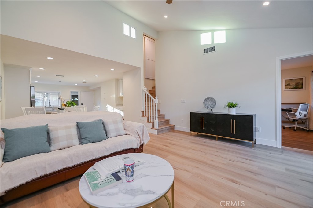 15 Camphor South Irvine, CA 92612 - Photo 3 of 28 a living room with furniture and a wooden floor