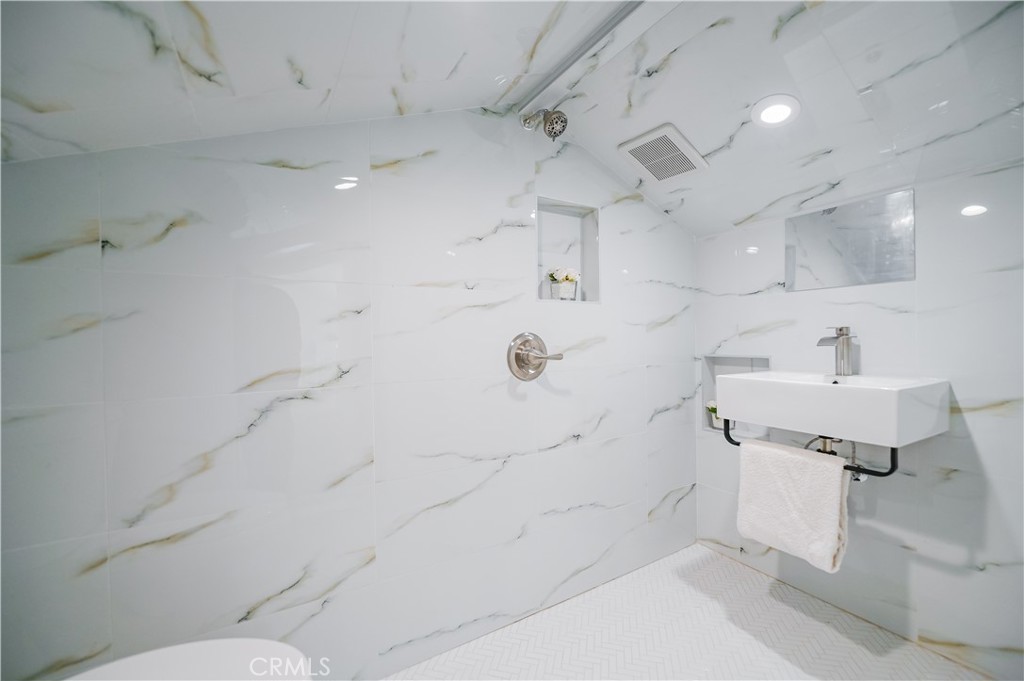 15 Camphor South Irvine, CA 92612 - Photo 8 of 28 a bathroom with a sink toilet and shower