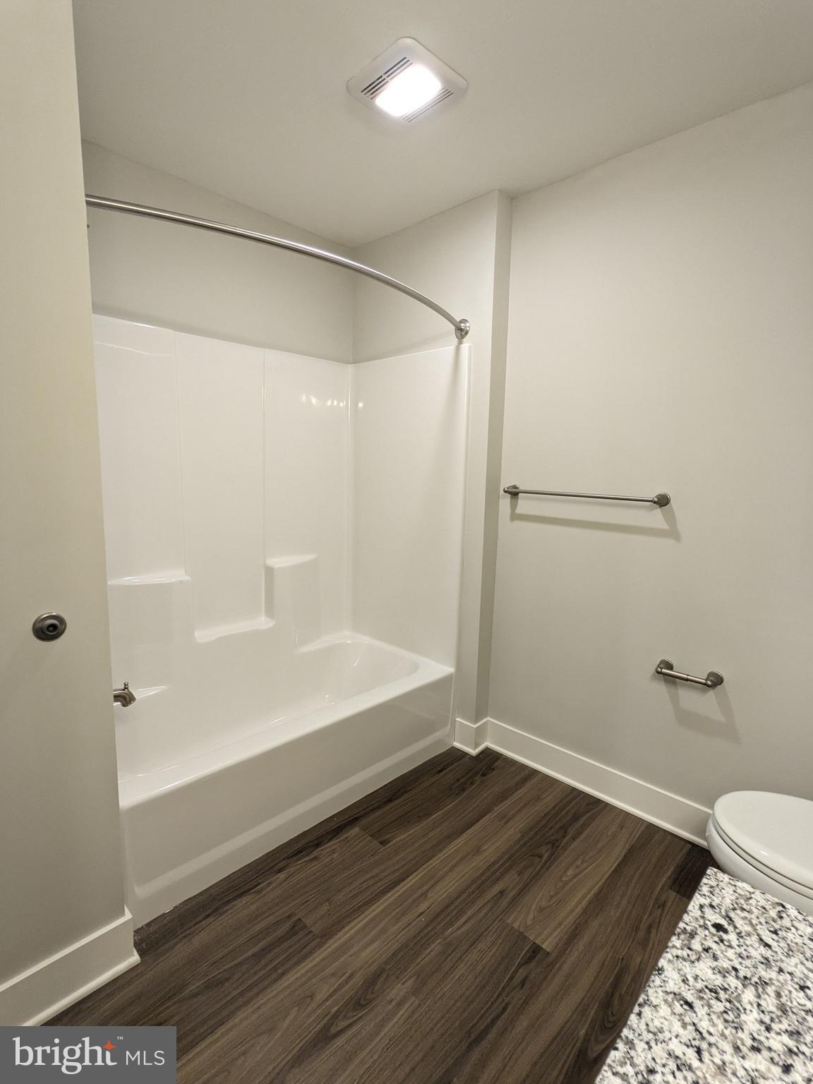 315 Locust Street Columbia, PA 17512 - Photo 9 of 25 a bathroom with a bathtub and shower