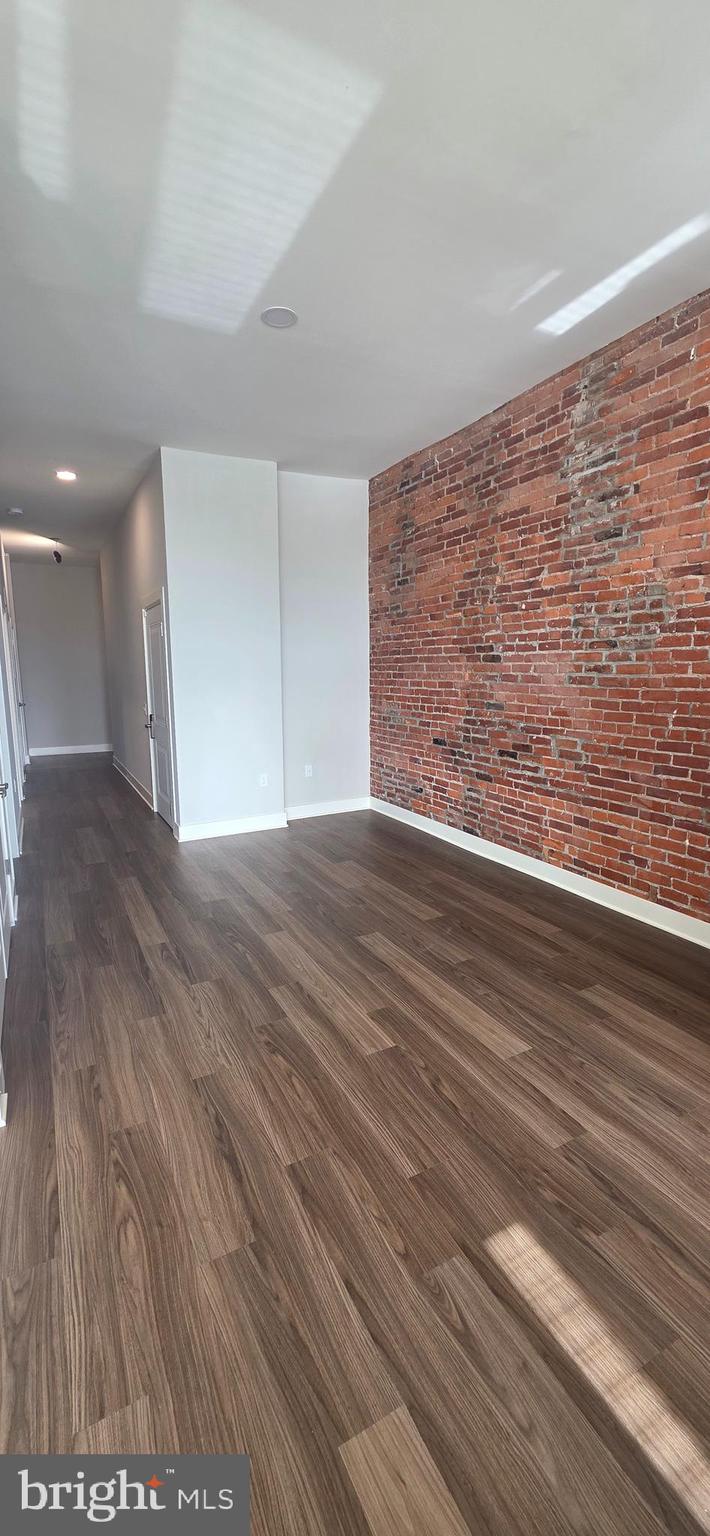 315 Locust Street Columbia, PA 17512 - Photo 5 of 25 a view of an empty room with wooden floor