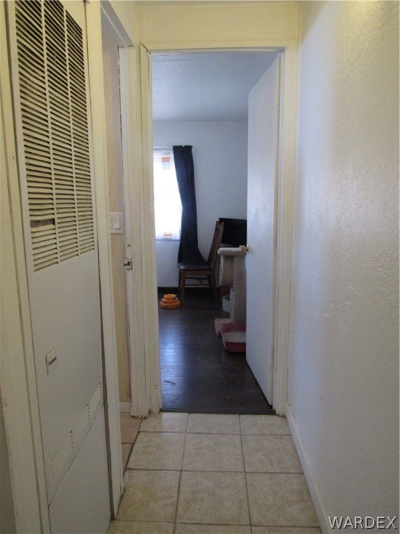 1846 Rio Grande Road Bullhead City, AZ 86442 - Photo 13 of 18 a view of a hallway with wooden floor and a living room