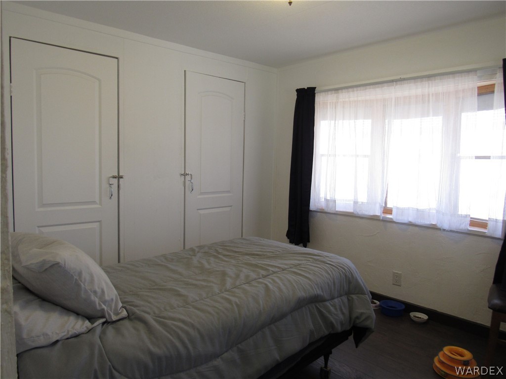 1846 Rio Grande Road Bullhead City, AZ 86442 - Photo 15 of 18 a bedroom with a bed and a window